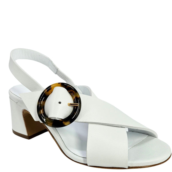 White leather singback sandal side view with block heel and tortoiseshell buckle