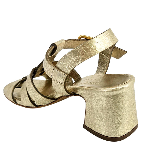 Gold metallic gladiator heeled sandal, back view with wide straps