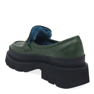 Green loafer with blue shearling collar and chunky black outsole
