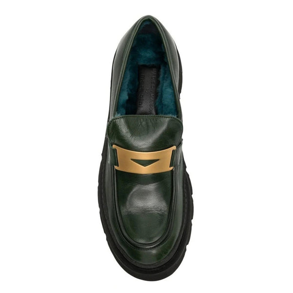 Green leather loafer top view with blue shearling lining and gold strap