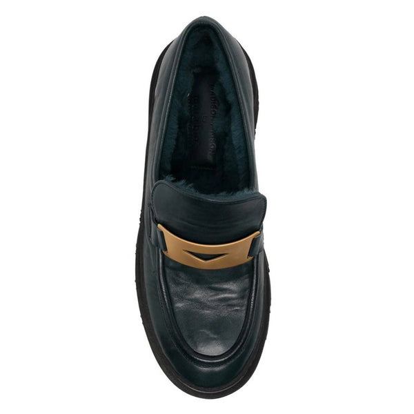 Top view slip-on chunky leather loafer showing shearling lining and gold strap