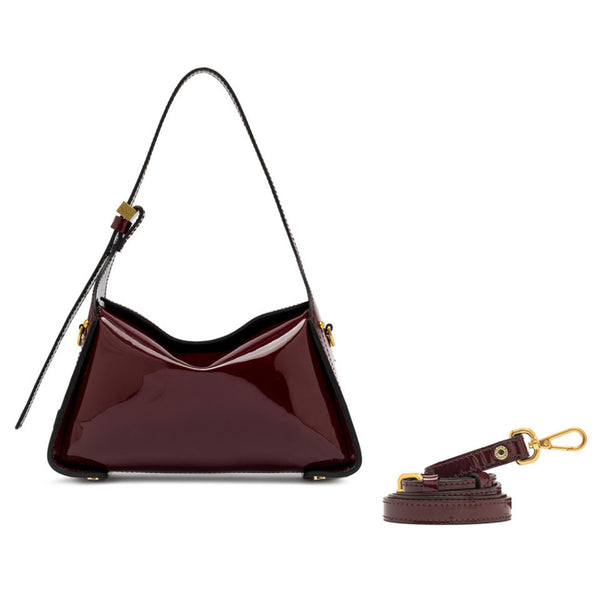 Dark berry patent-leather triangle shoulder handbag with top handles and gold hardware