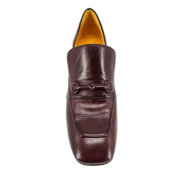 Chocolate leather hidden-heel loafer, top view, slip-on with decorative bit strap