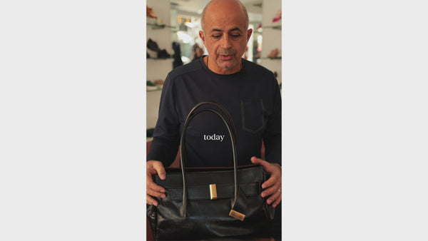 Owner David Talking about new collection of shoulder bags just arrived from itally. 