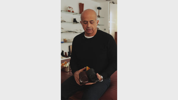owner talking about the construction and the quality of the newloafers 