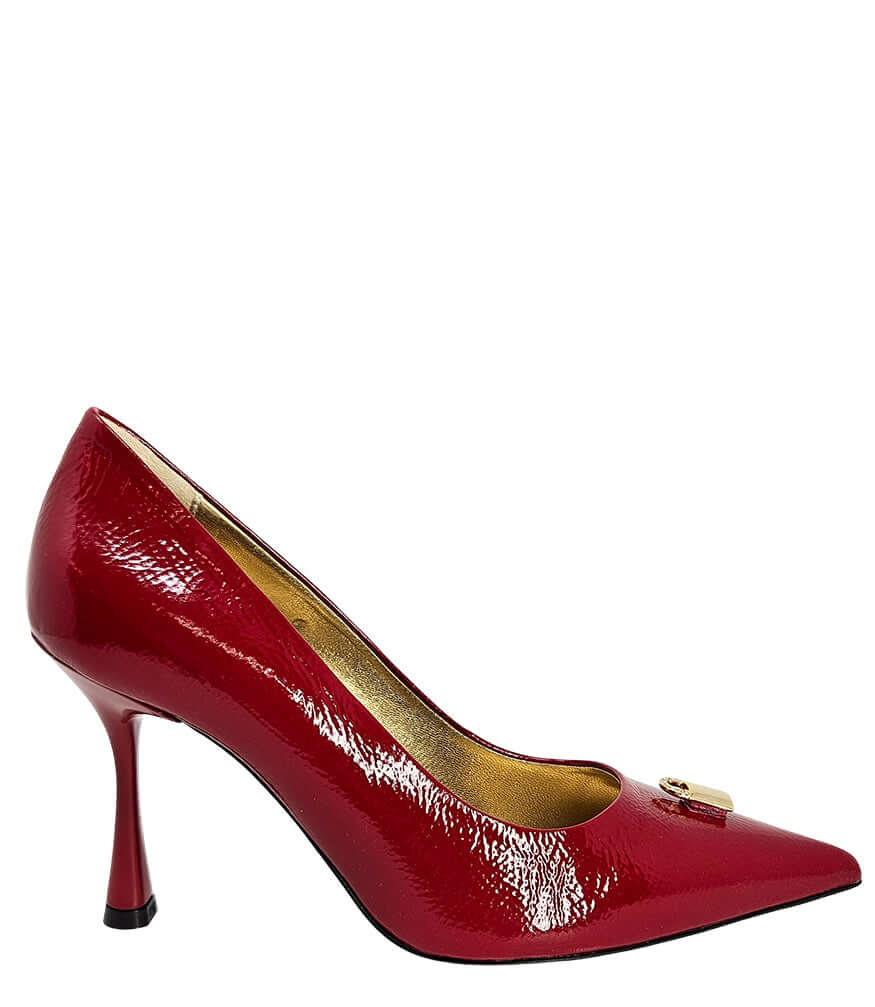 Red patent pointed-toe pump with stiletto heel and lock buckle detail