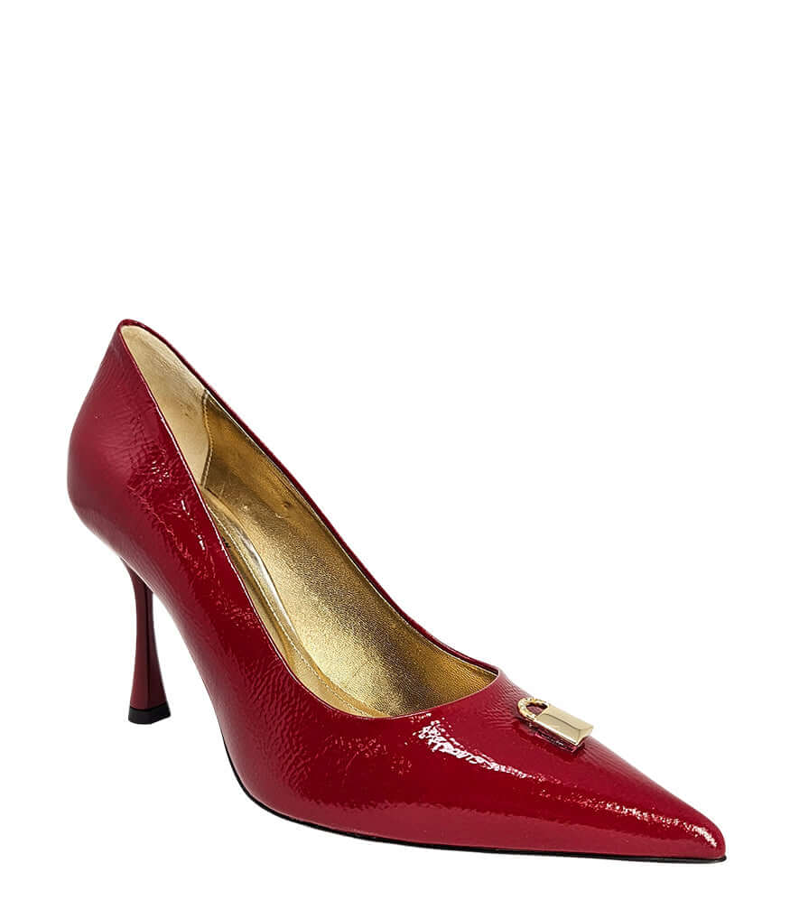 Red patent pointed-toe pump with stiletto heel and lock buckle detail