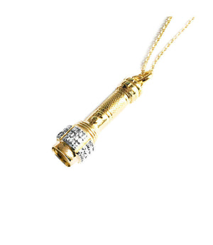 Gold necklace with cylindrical crystal pendant and link chain
