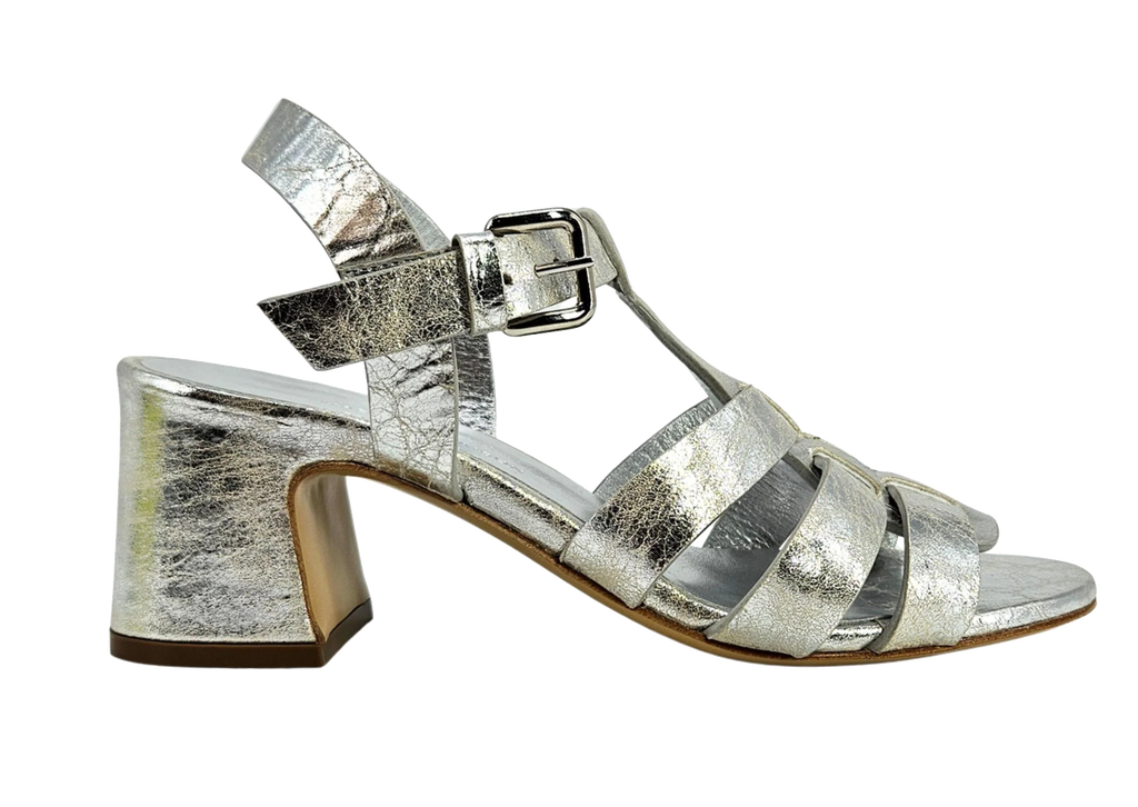 Silver metallic gladiator heel sandal with wide straps and block heel, buckle