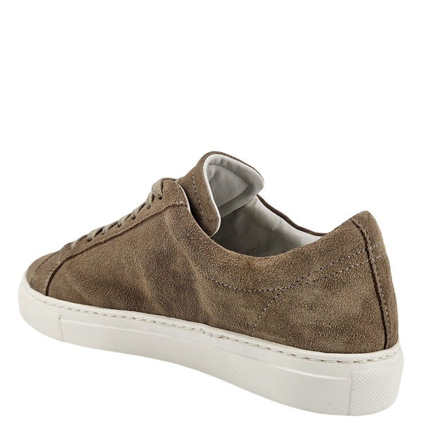 Beige suede low-top sneaker viewed from heel, white rubber cup sole