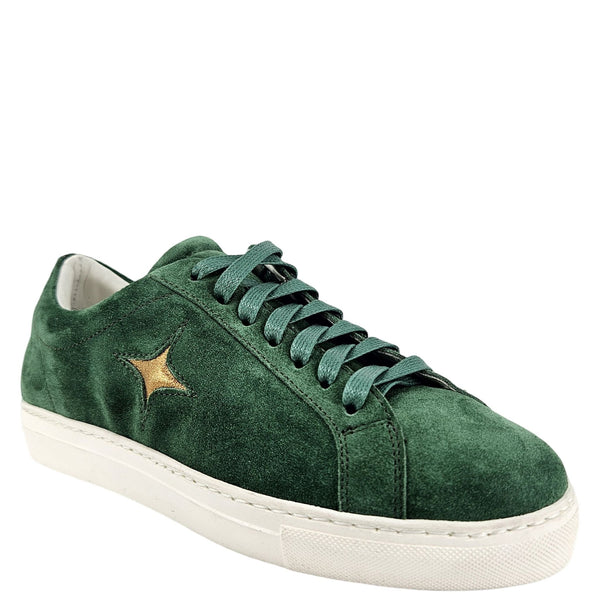 Green suede lace-up sneaker with gold star patch on side and white platform sole