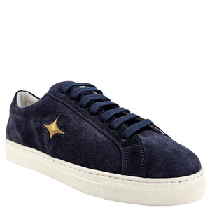Navy suede womens sneaker with lace-up closure and gold star detail, white platform sole.