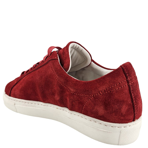 Red suede low-top sneaker back view with padded collar and white rubber sole