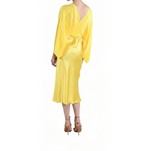 Yellow silk midi dress with wide V back opening and flowing wide sleeves