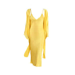 Yellow silk midi slip dress with V-neck and long draped sleeves, front view