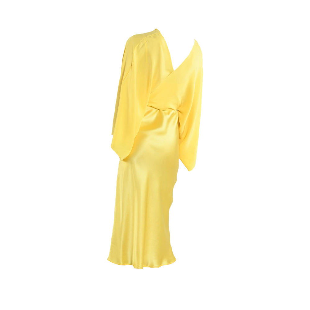 Yellow silk midi slip dress with V-neck and long draped sleeves, front view