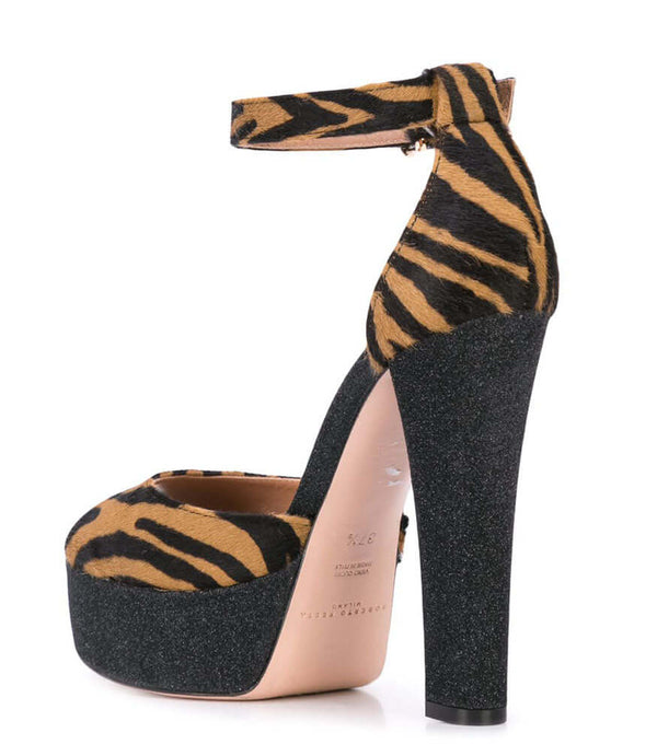 Zebra-print platform heel sandal with ankle wrap strap and thick black heel