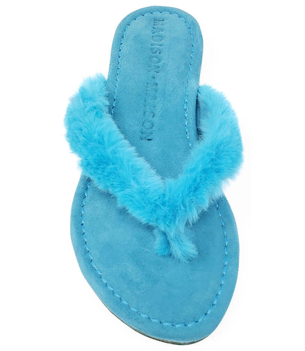 Turquoise faux-fur thong sandal showing stitched blue footbed