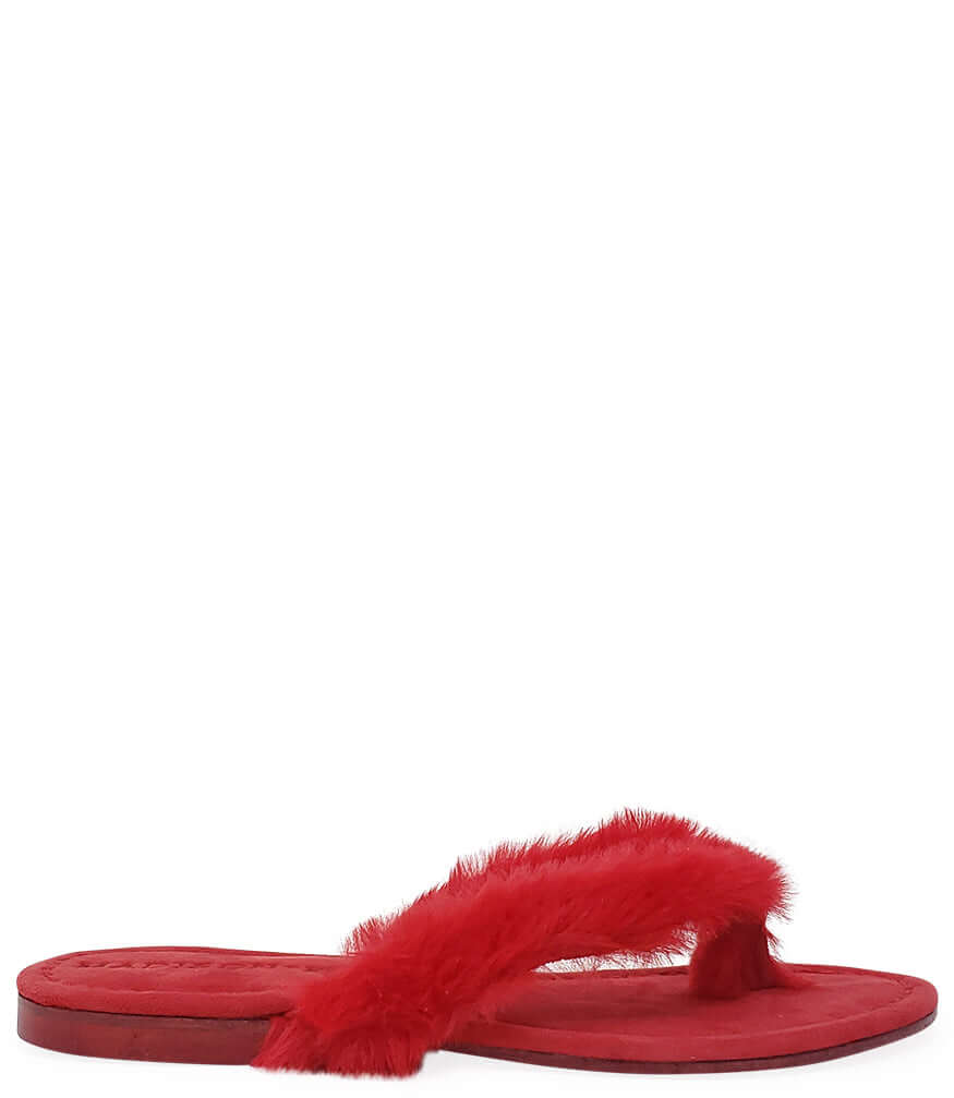Red thong sandal with wide red faux-fur strap and flat sole