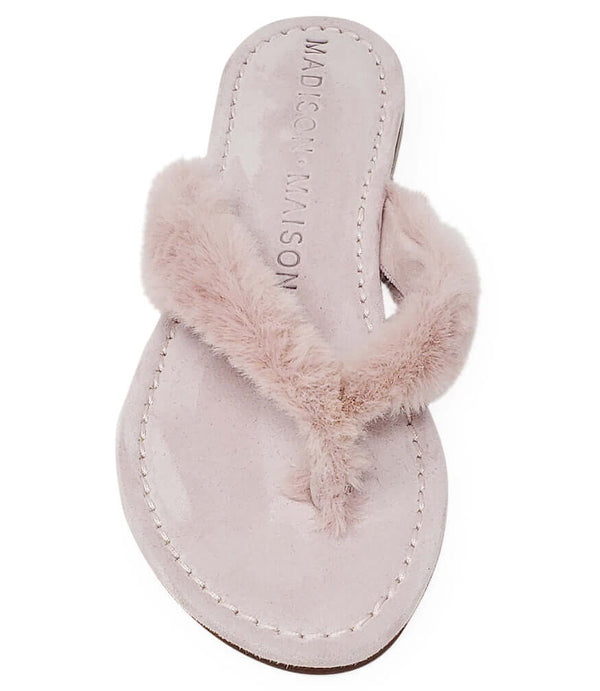 Light pink fabric thong sandals with faux-fur ankle strap and stitched toe loop
