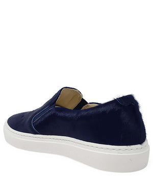 Navy short-hair slip-on calf sneaker showing heel and padded collar, white sole