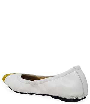 White ballet flat with yellow calf-hair toe tip and low profile sole