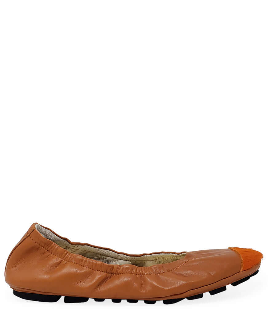 Tan-brown leather ballet flat with orange calf-hair toe tip and black sole