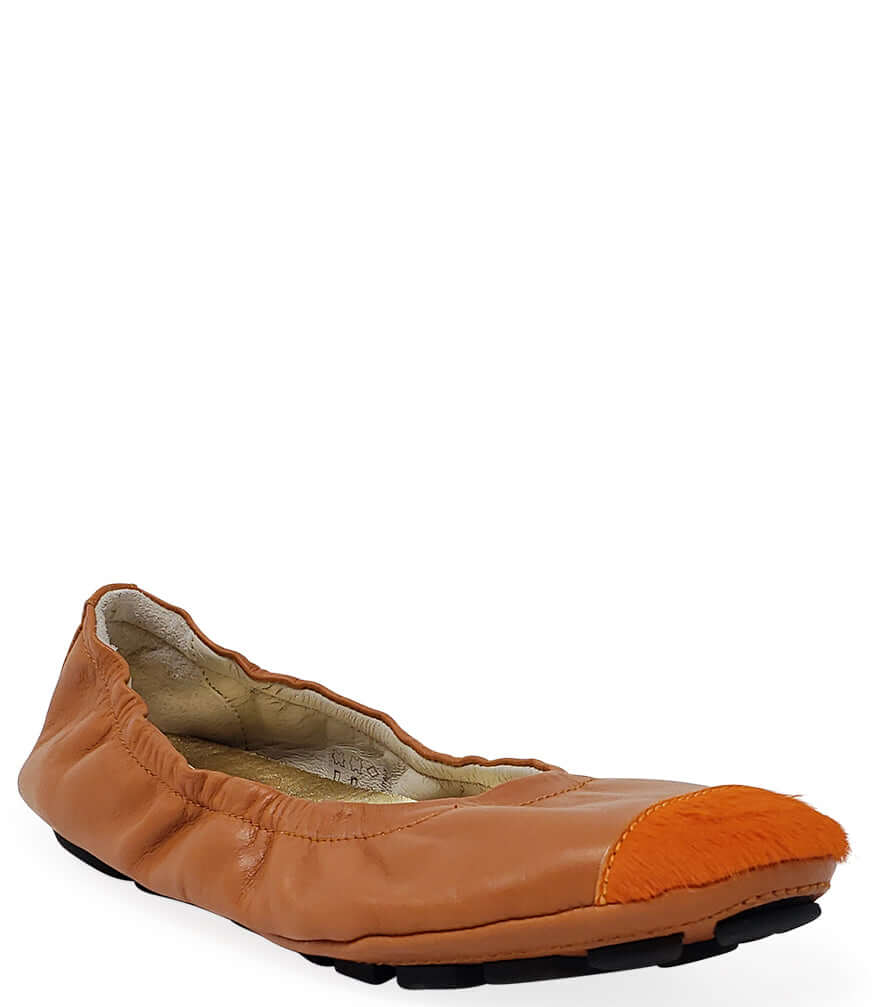 Tan-brown leather ballet flat with orange calf-hair toe tip and black sole