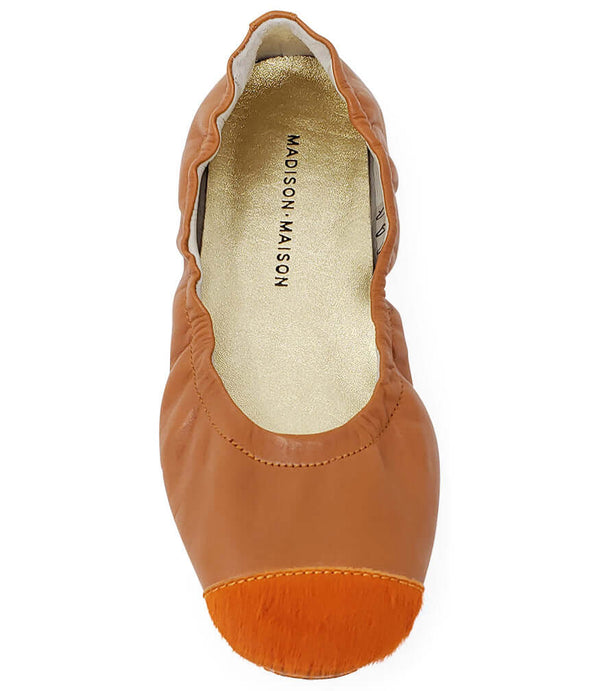 Ballet flat interior with tan lining and orange calf-hair toe tip; MADISON MAYSON