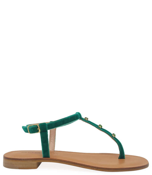 Emerald green jeweled thong sandal with T-strap and flat tan sole