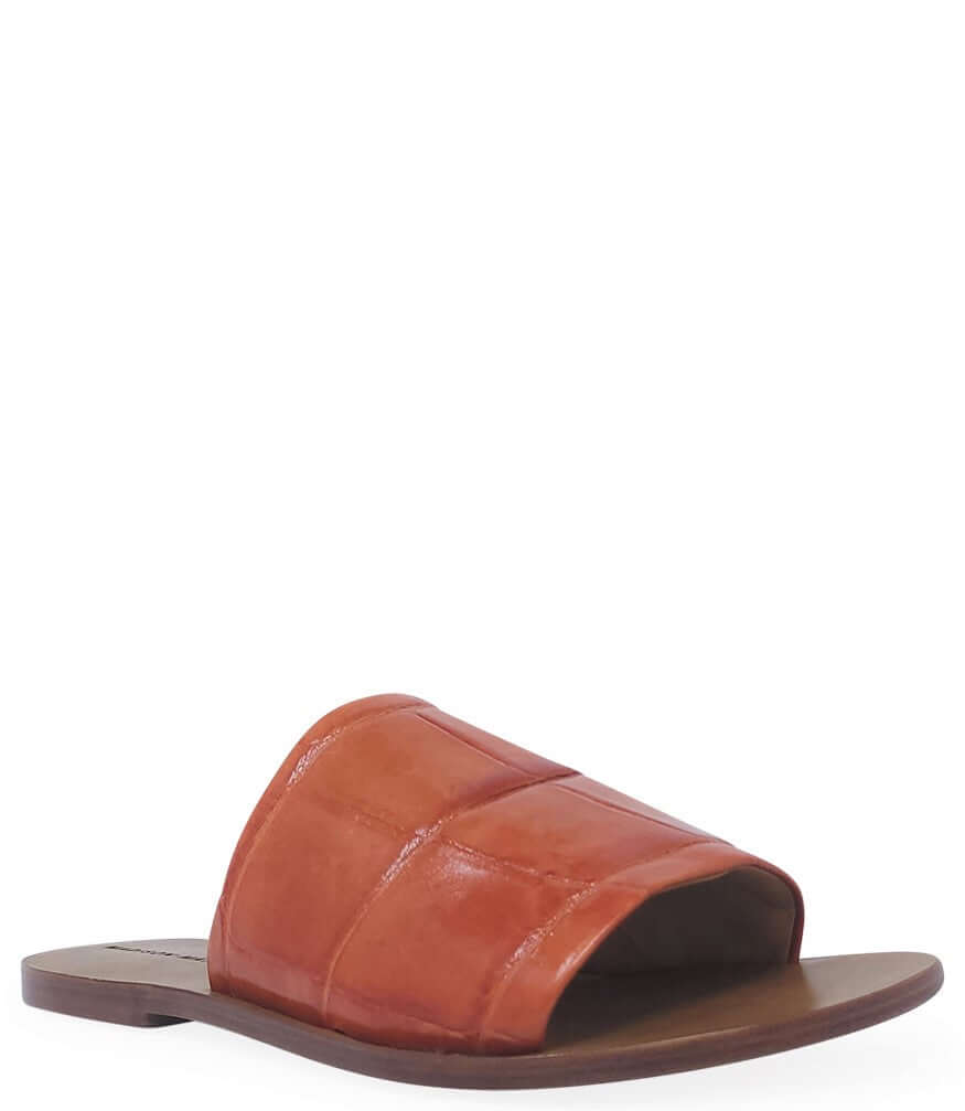 Orange open-toe slide sandal with flat sole and wide crossover vamp