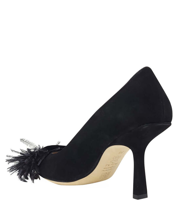 Black suede pointed-toe heel pump with black feather trim detail near the toe