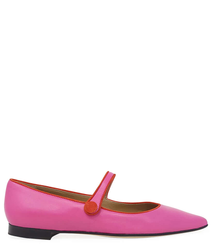 Pink leather pointy-toe ballet flats with cross strap and small round buckle detail