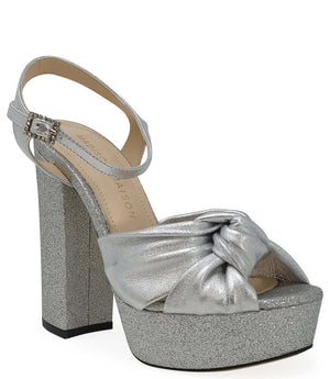 Silver glitter platform heel with ankle strap and knotted bow detail