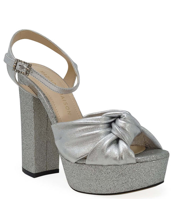 Silver glitter platform heel with ankle strap and knotted bow detail
