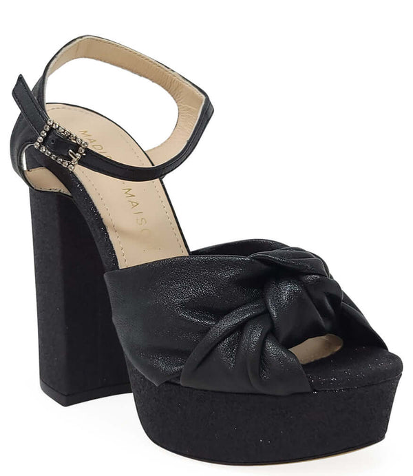 Black glitter platform sandal with ankle strap, bow front, block heel