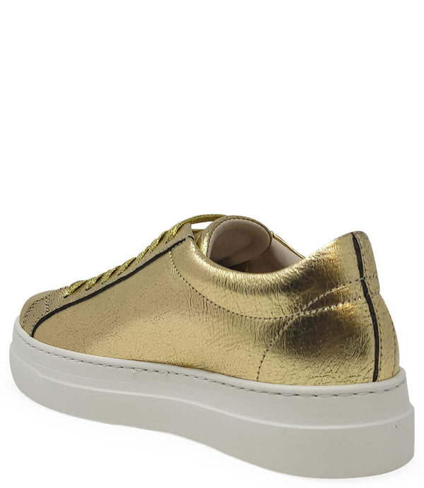 Gold metallic leather sneaker heel with white platform sole and lace-up closure
