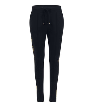 Black sweatpants with gold side stripe, tapered jogger fit