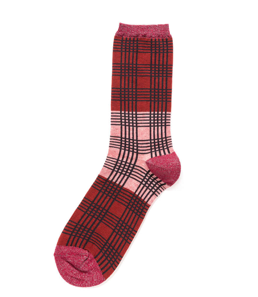 Salmon pink floppy socks with dark red plaid pattern and ribbed cuff