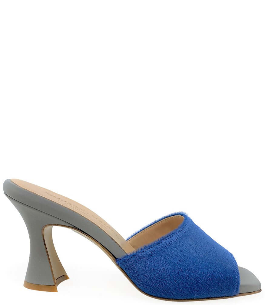 Denim blue calf hair heel mule with open toe and chunky gray heel