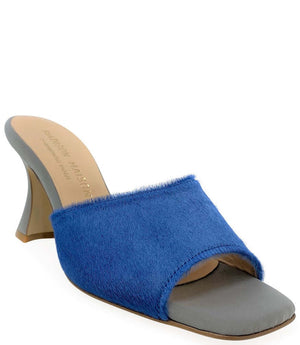 Denim blue calf hair mule with open toe and gray block heel, side view