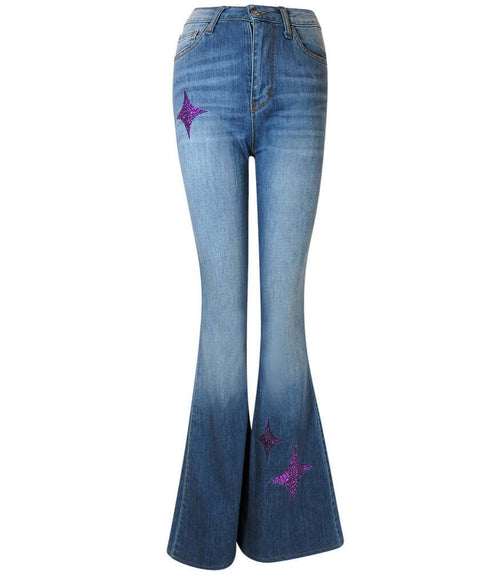 Light blue denim bell-bottom jeans with purple glitter star patches at legs