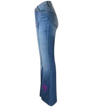 Light blue side-view bell-bottom jeans with purple glitter star patch on hem