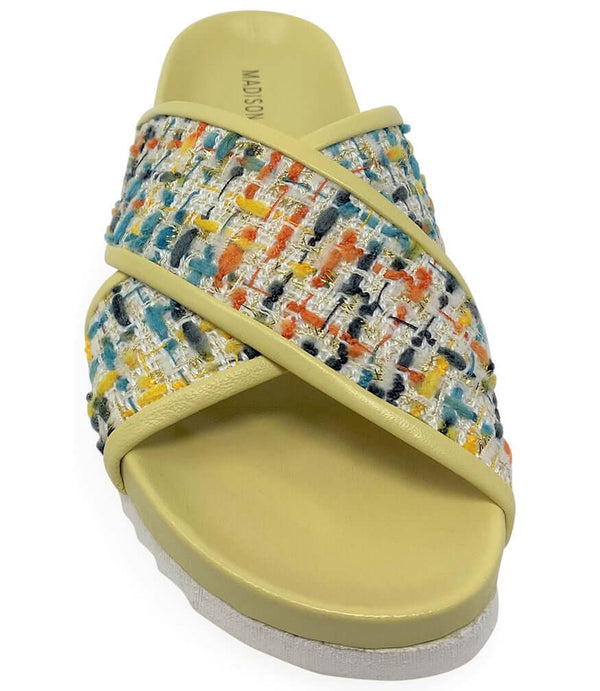 Yellow cross strap sandal with multicolor woven upper and cushioned sole