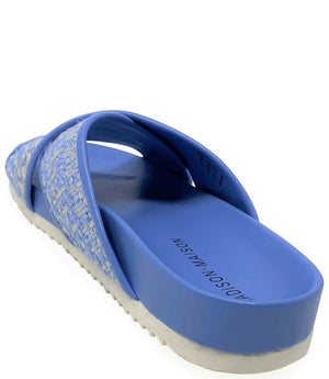 Sky blue cross-strap slide sandal with woven textile upper and cushioned sole