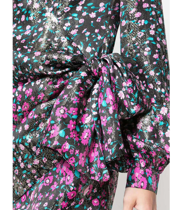Fuchsia floral short dress close-up: tied waist and long puff sleeves